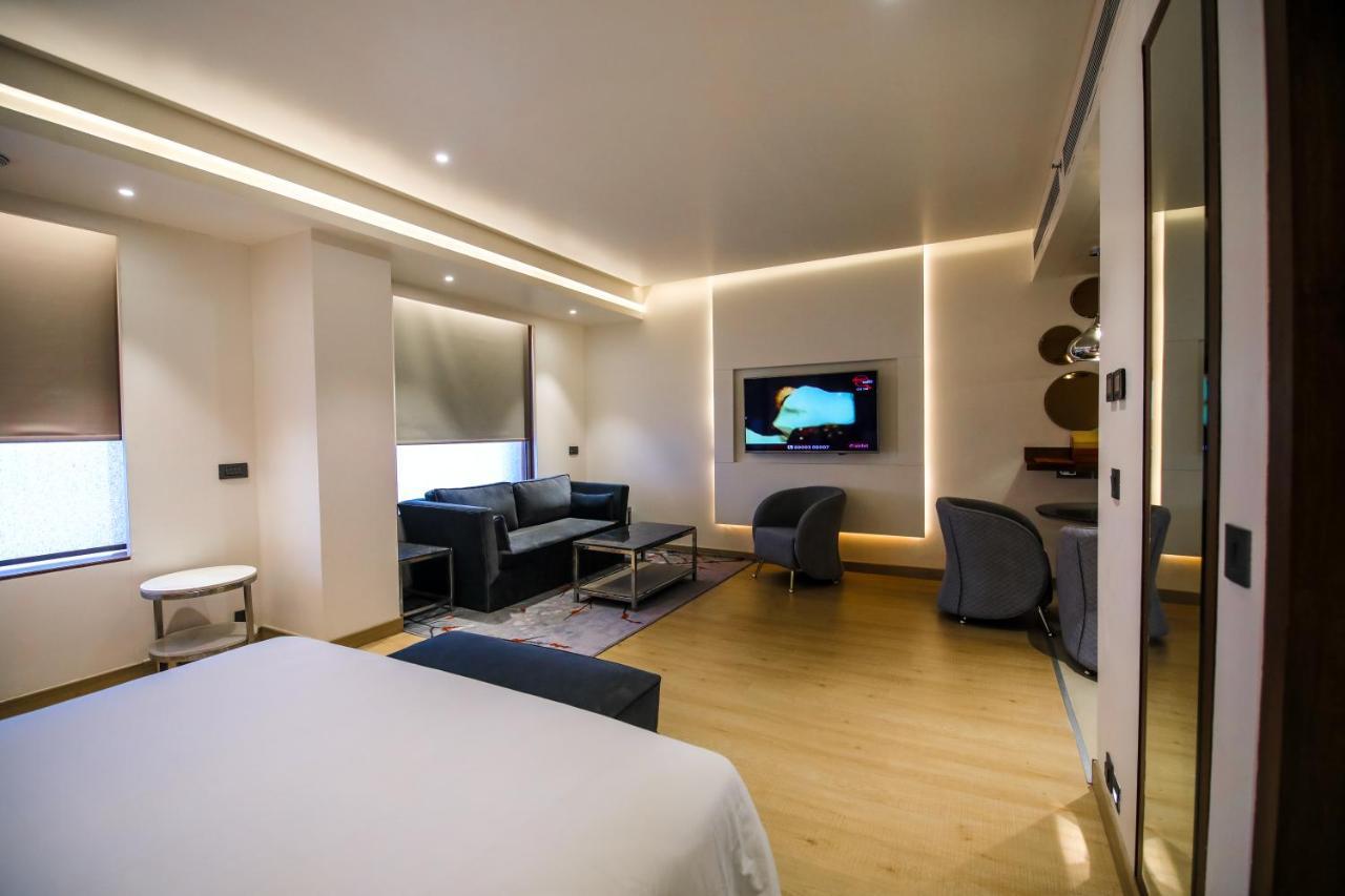 Отель Radisson Blu Towers Kaushambi Delhi Ncr Газиабад Экстерьер фото A room at the hotel