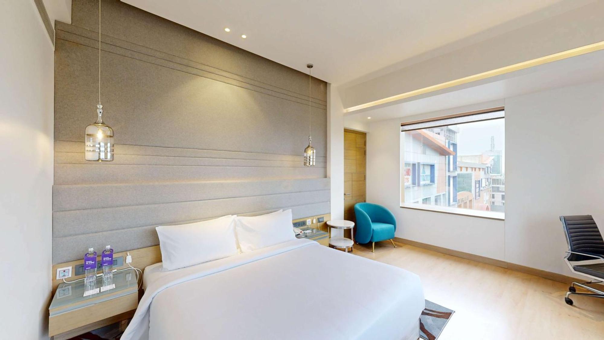 Отель Radisson Blu Towers Kaushambi Delhi Ncr Газиабад Экстерьер фото A room at the hotel